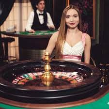 gaming slot live-dealer studio with human croupiers